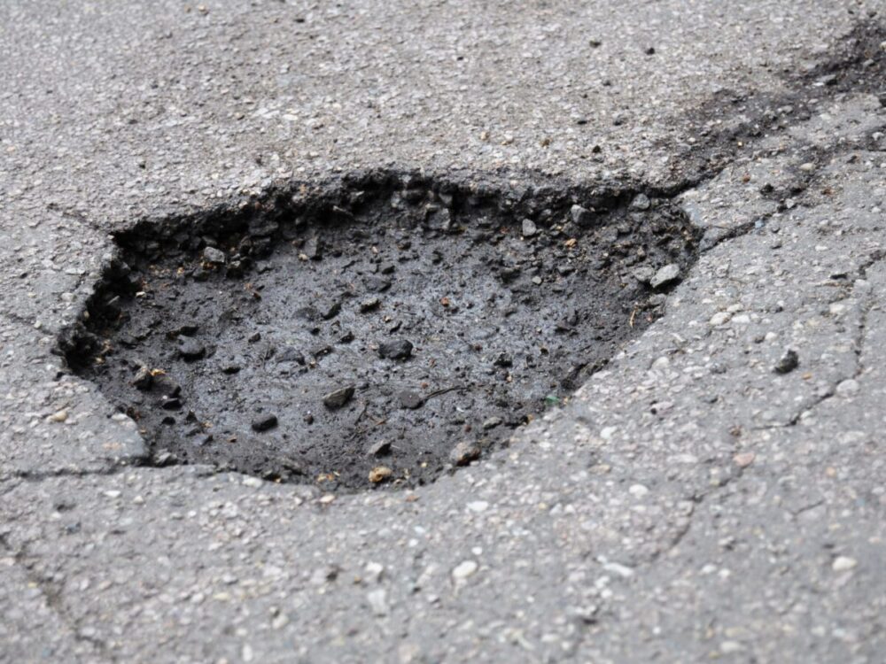 Potholes and uneven pavement in Belleview - Ocala-News.com