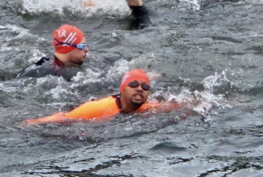 Zachary Deonath swimming during the event