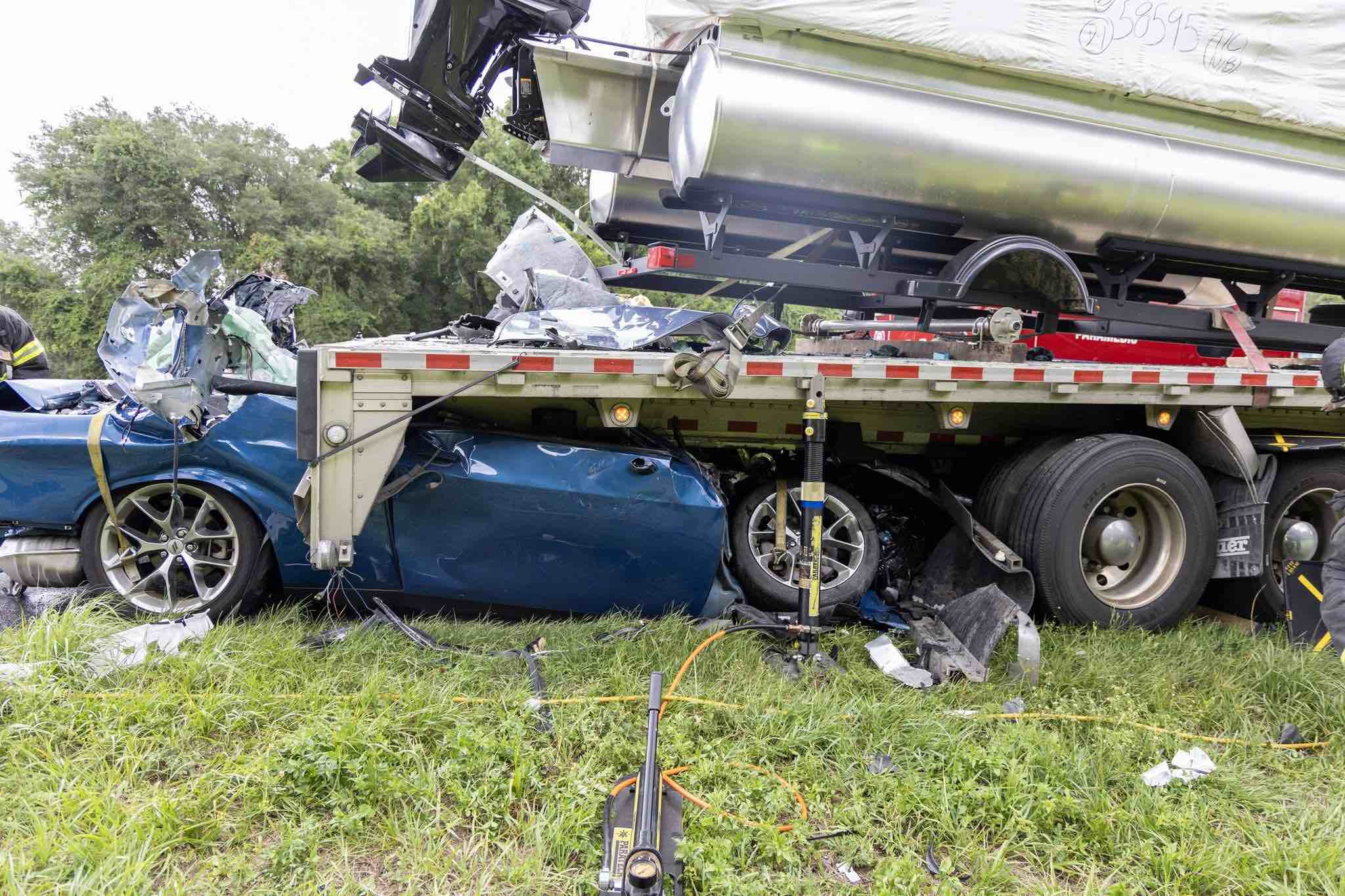 Car crashes into back of parked semi truck on I 75