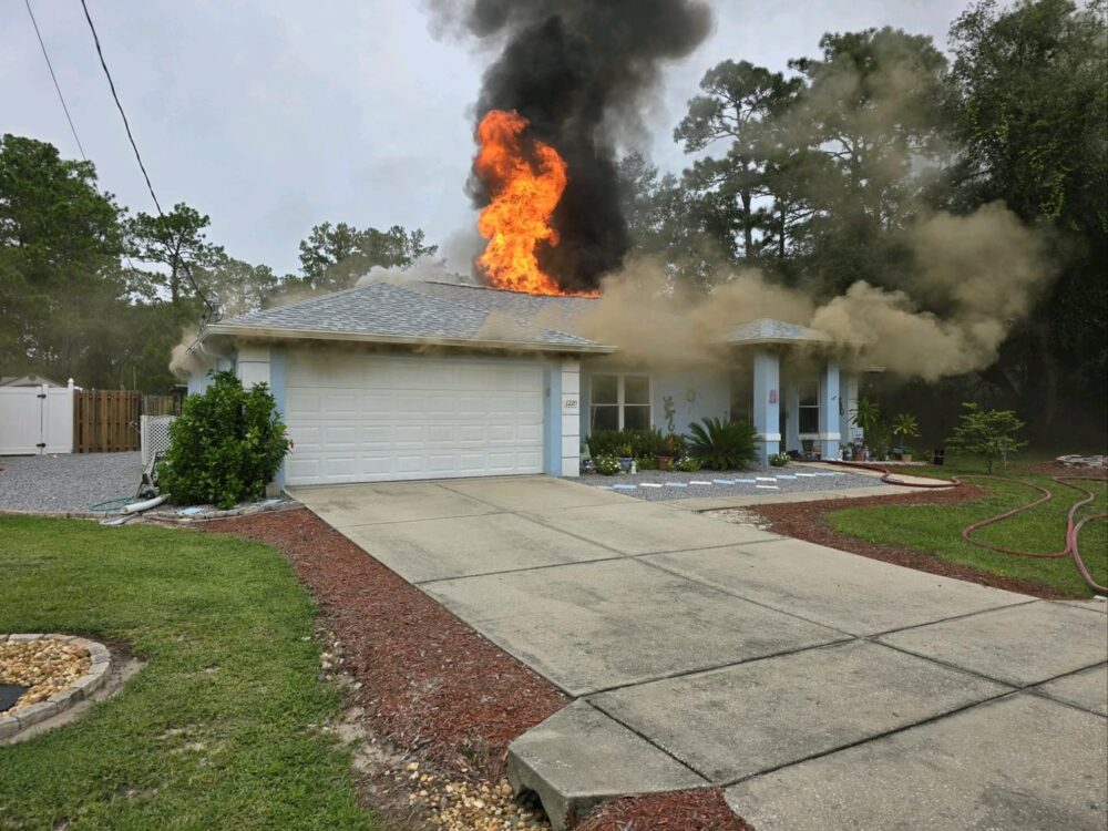 Flames and smoke rising from the roof of a Silver Springs home on September 8, 2024. (Photo: Marion County Fire Rescue)