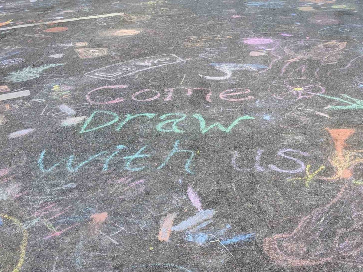 Chalk art sketch on pavement in downtown Ocala in 2018