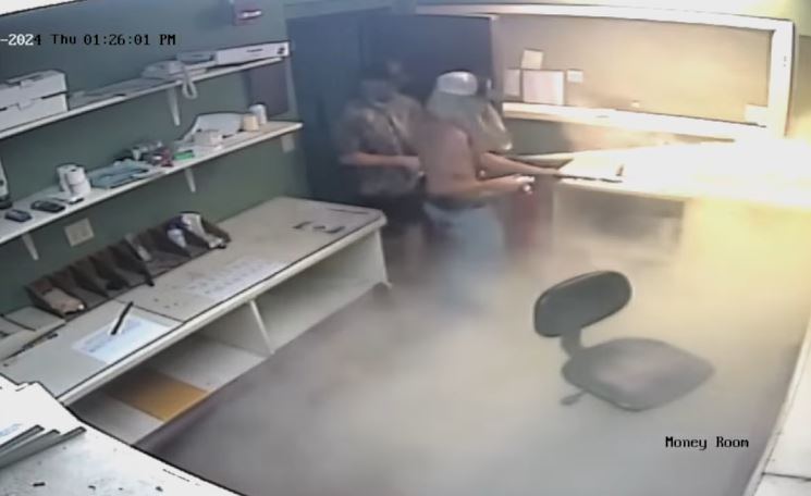 Several unidentified suspects discharging a fire extinguisher inside the vacant Ocala Jai Alai building last month. (Photo: Marion County Sheriff's Office)