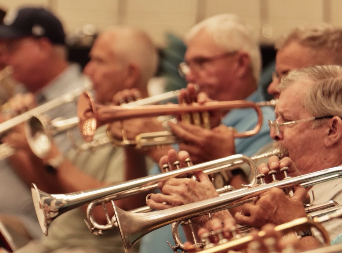 Horn players in the Kingdom of the Sun Concert Band.