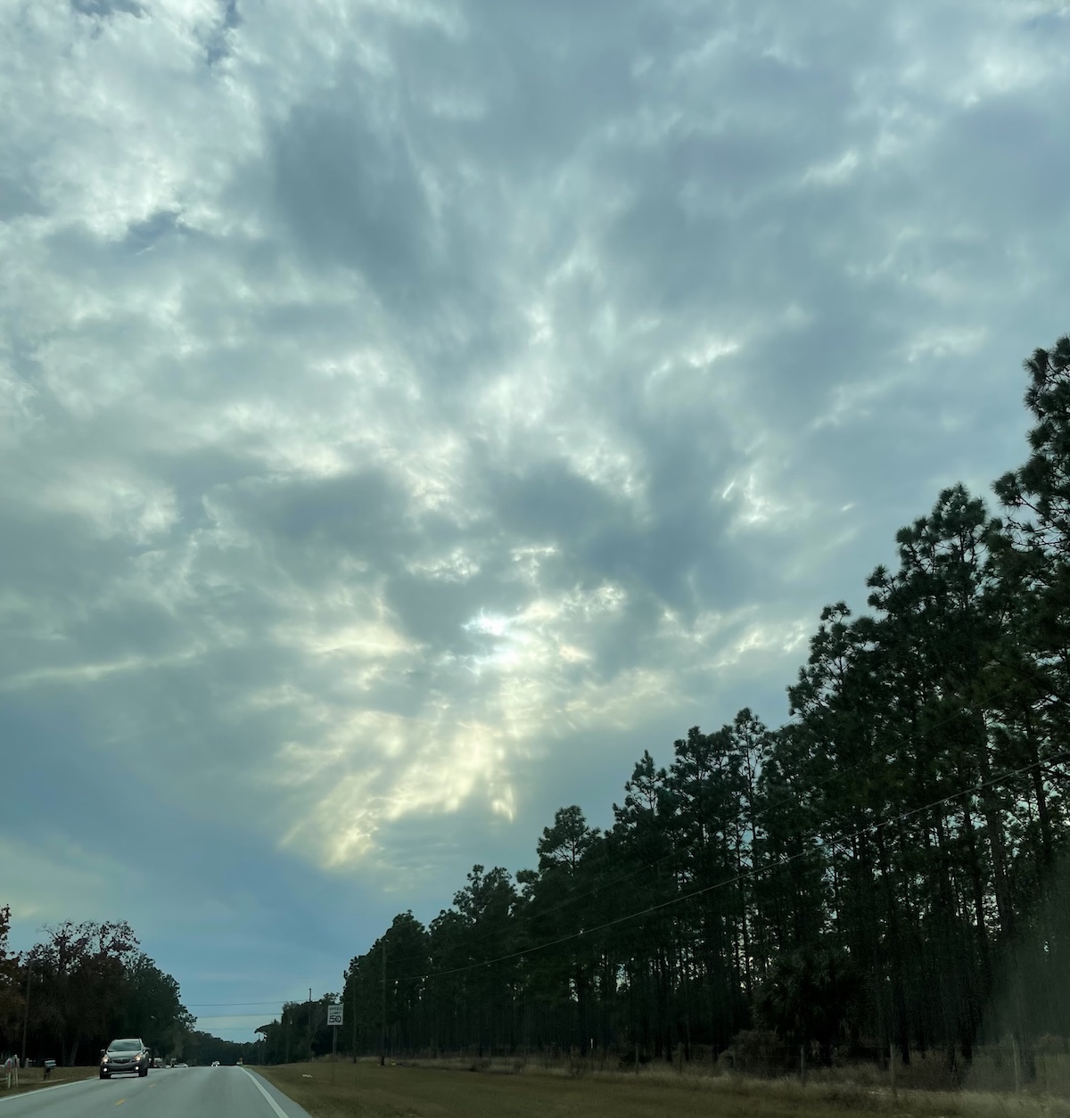 Sunlight peeking through the clouds in Ocklawaha